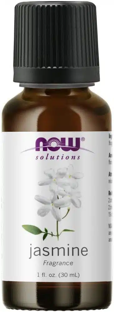 A brown bottle with a white label of jasmine essential oil