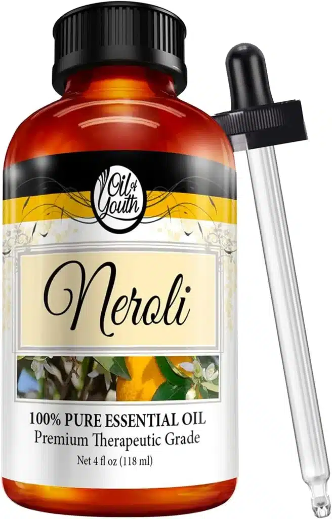 A bottle of neroli essential oil with a sprayer