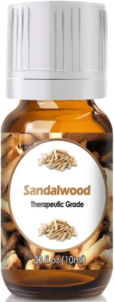 A bottle of sandalwood oil with a white lid